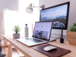 Laptop and PC setup on a desk